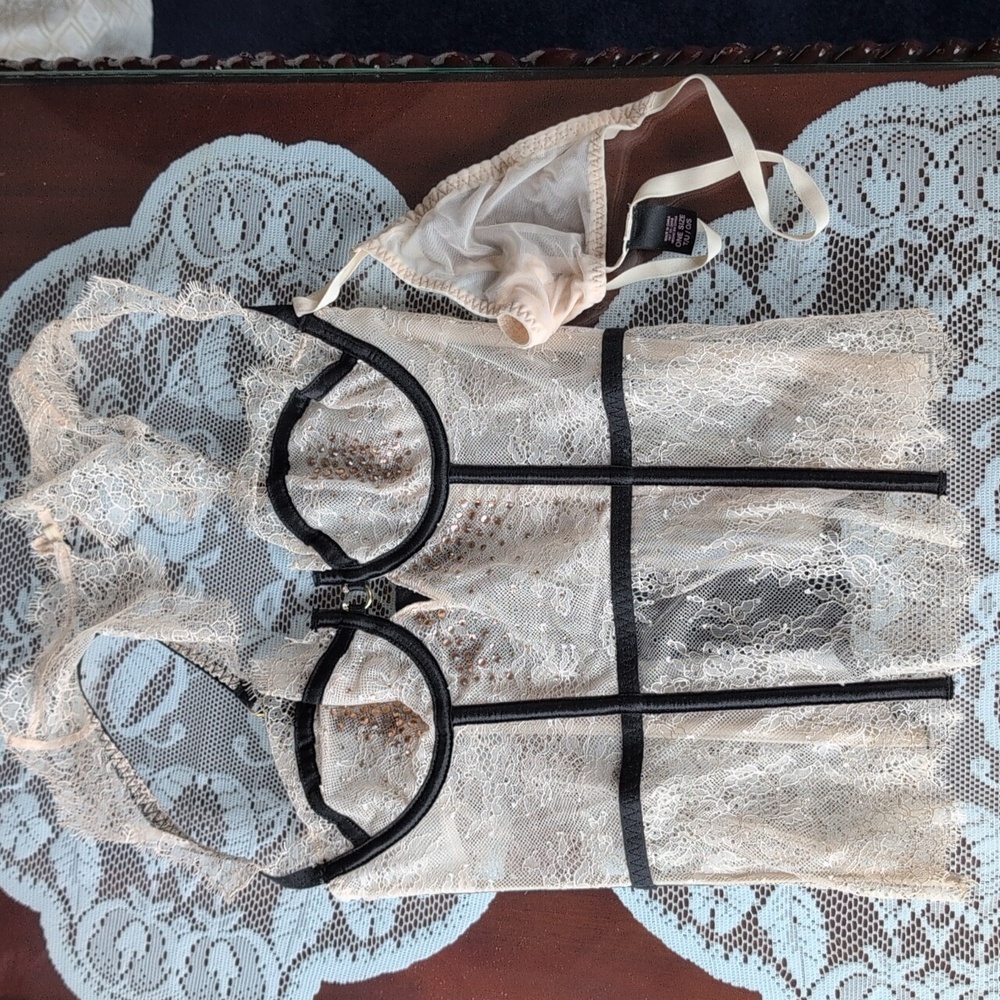 A Stunning 2 Piece Negligee.  A Flesh And Black Corsica And G String.